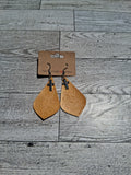 Cross charm earring